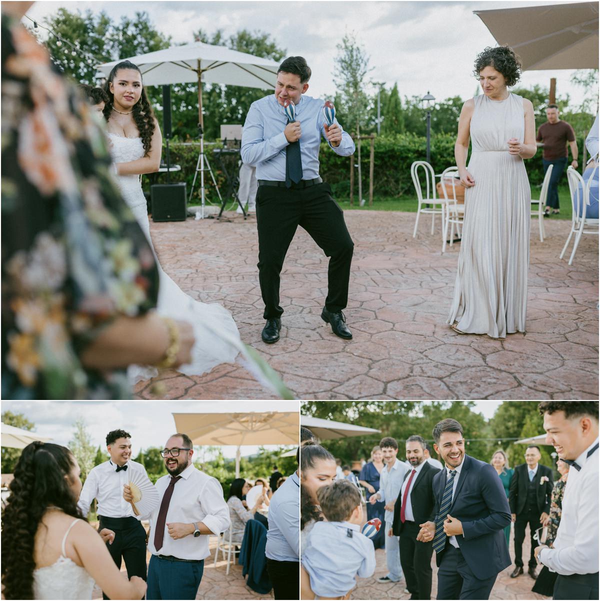 Momenti di ballo e risate tra gli ospiti e lo sposo durante la festa di matrimonio