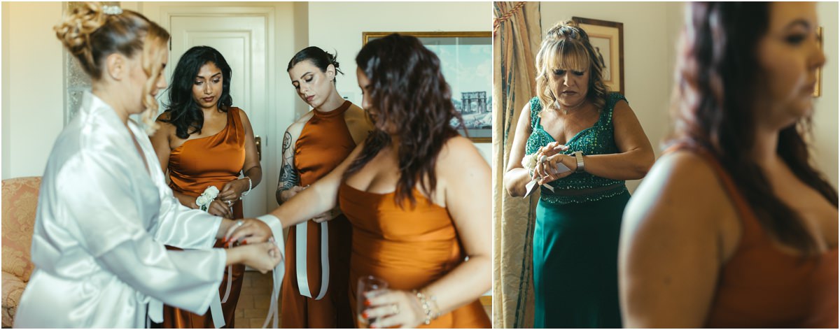 Bridesmaids Getting Ready Bride Miriana with bridesmaids in orange satin dresses and a woman in a green dress getting ready