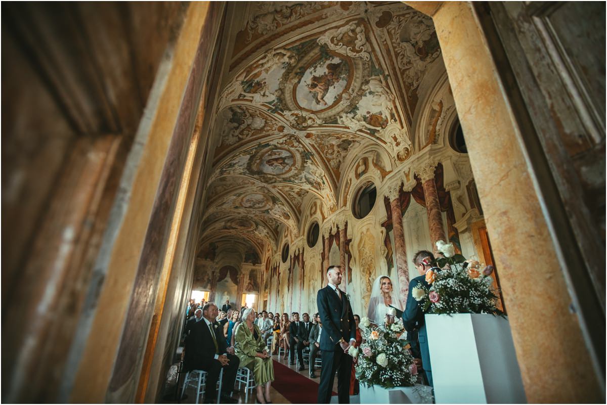 Civil Ceremony Under the Frescoes of the Pannini Gallery Wide view of the civil ceremony of Miriana and Angus under the frescoed ceiling of the Pannini Gallery, Villa Grazioli