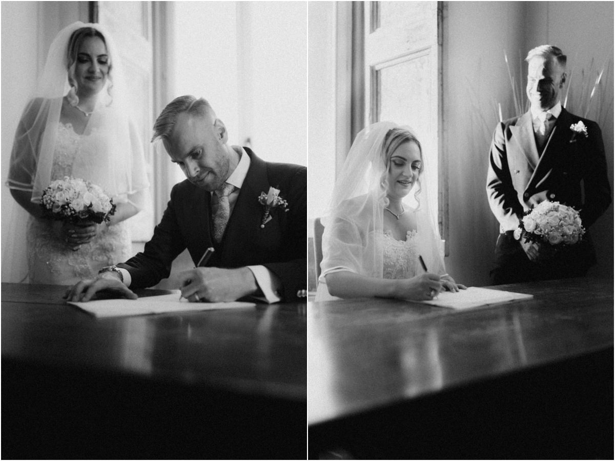 Signing the Marriage Register, Black and White Black and white photo of Angus and Miriana signing the marriage register after the civil ceremony