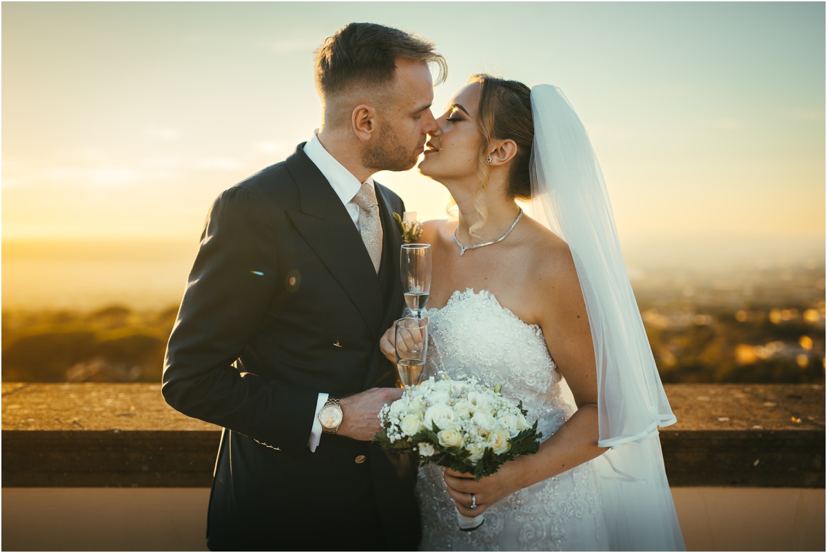 Kiss in the Golden Hour at Villa Grazioli Angus kissing Miriana in the golden hour light on the terrace of Villa Grazioli, Castelli Romani