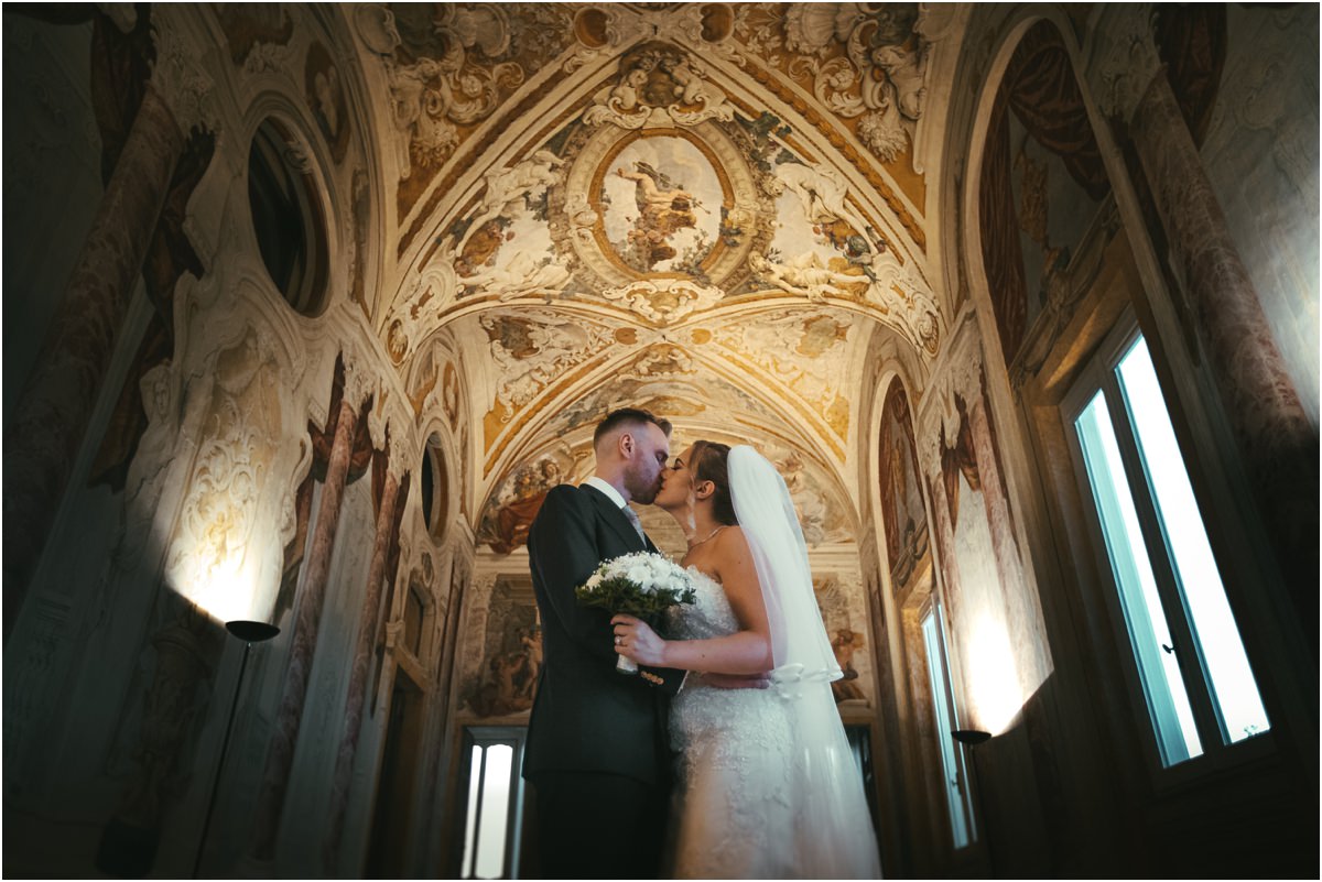 Kiss Under the Frescoes of the Pannini Gallery Miriana and Angus kissing under the frescoed ceiling of the Pannini Gallery at Villa Grazioli