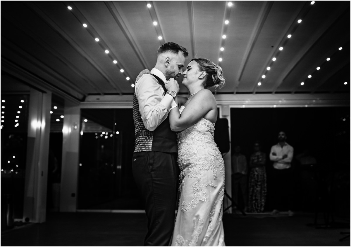 First Dance, Black and White Black and white photo of Miriana and Angus sharing their first dance under string lights