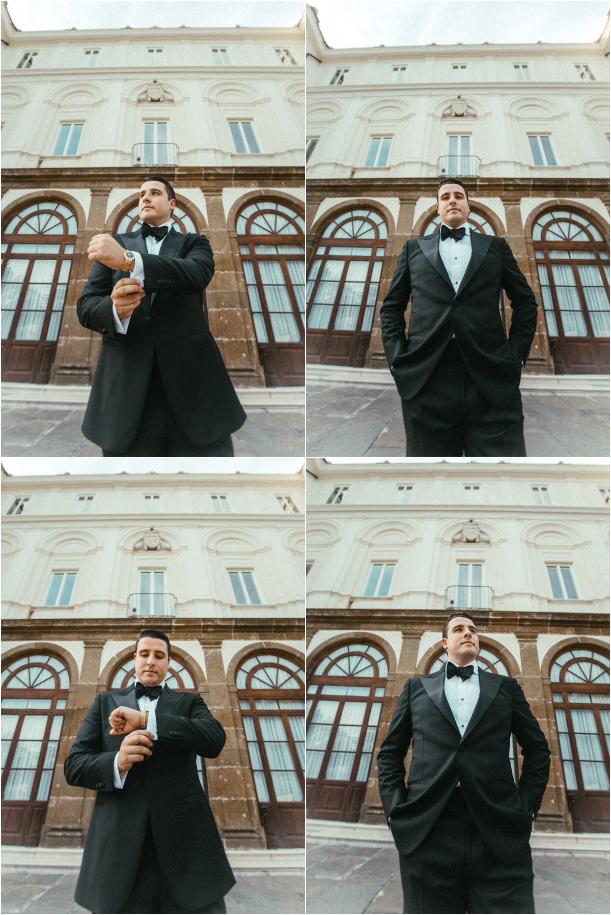 Groom in Front of Villa Grazioli Low angle portraits of groom Alessio checking his watch in front of the facade of Villa Grazioli