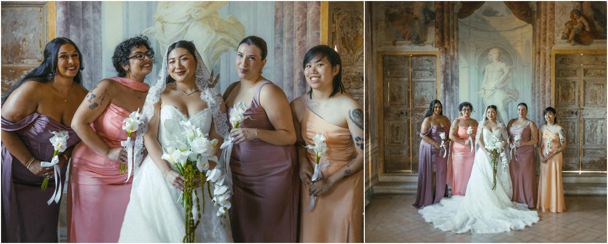 Bride and Bridesmaids Bride Leah with her five bridesmaids in pastel satin dresses in a frescoed room of Villa Grazioli