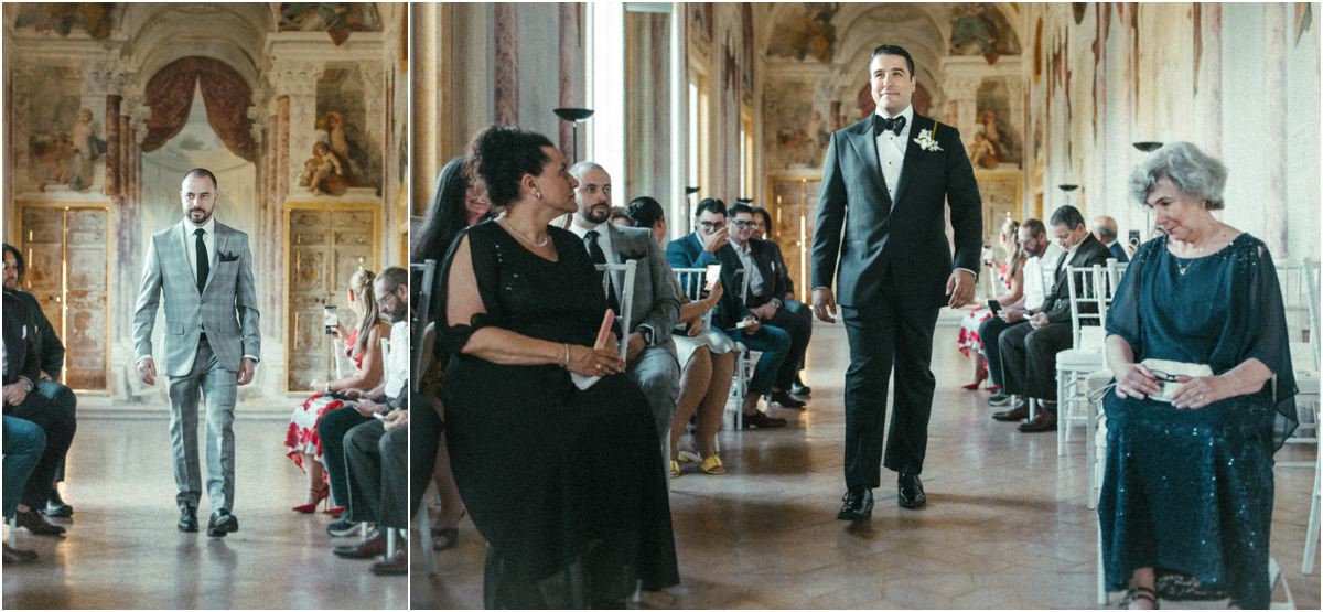 Groom Walking Down the Aisle Groom Alessio walking down the aisle of the Pannini Gallery at Villa Grazioli, guests seated on both sides
