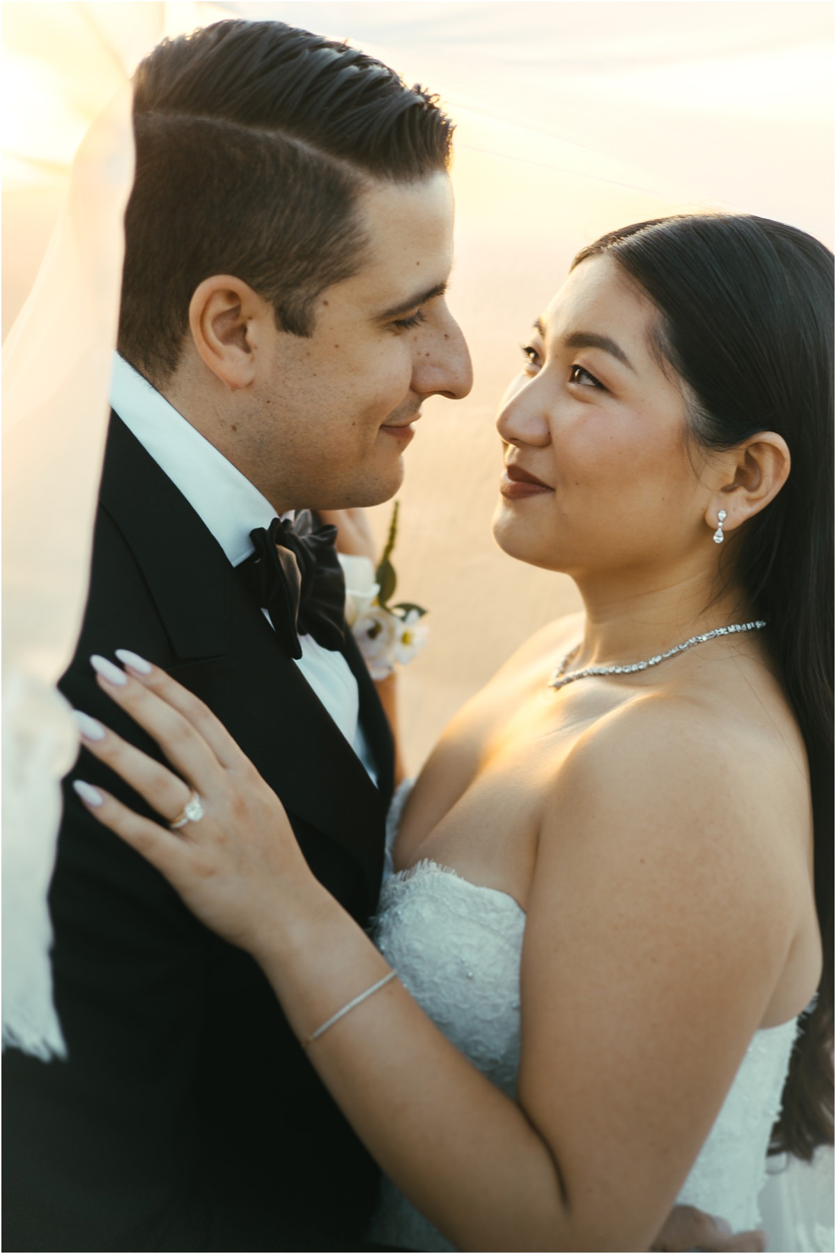 Alessio and Leah, Close Portrait Close portrait of Alessio and Leah looking into each other's eyes, her hand on his chest